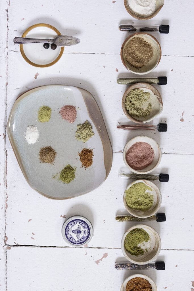 Overhead image of a variety of spices laid out on a table